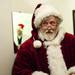 Santa looks around the corner before being announced at the Sing Along With Santa event on Saturday. Daniel Brenner I AnnArbor.com